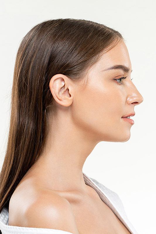 Side view beauty shot of young woman